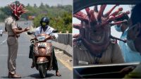 Polisi Gunakan Helm ‘Sangar’ untuk Cegah Warga Keluyuran